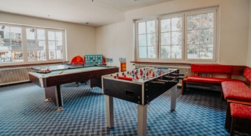 Games room with pool table and table football, Bad Hofgastein hotel